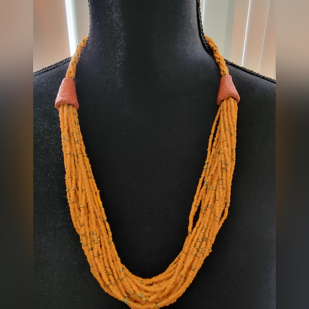 NWOT Handmade in Kenya Intertwined Coral Beads